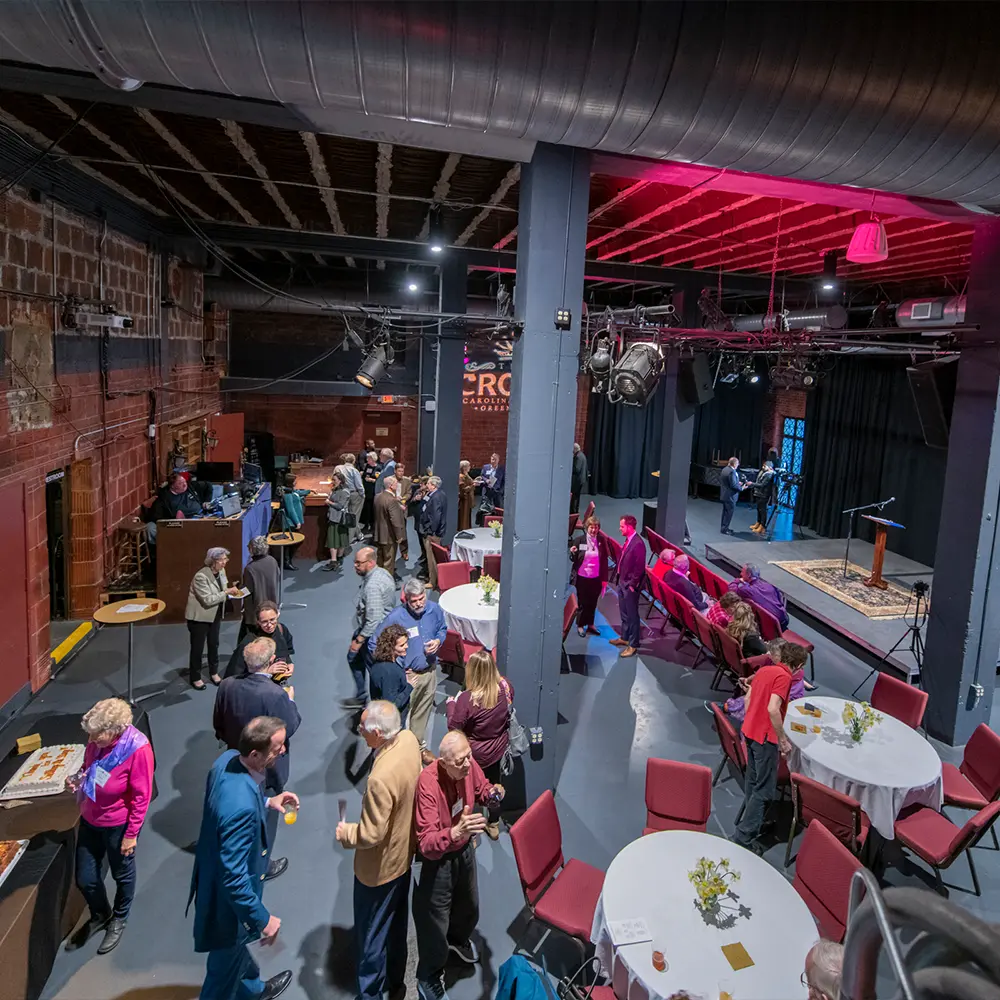 The Crown at the Carolina — exposed brick walls and lead-paned windows